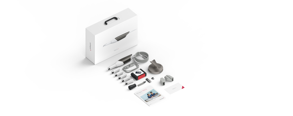 Scanner kit box with accessories arranged neatly